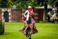 Armored knight suited for battle on horseback